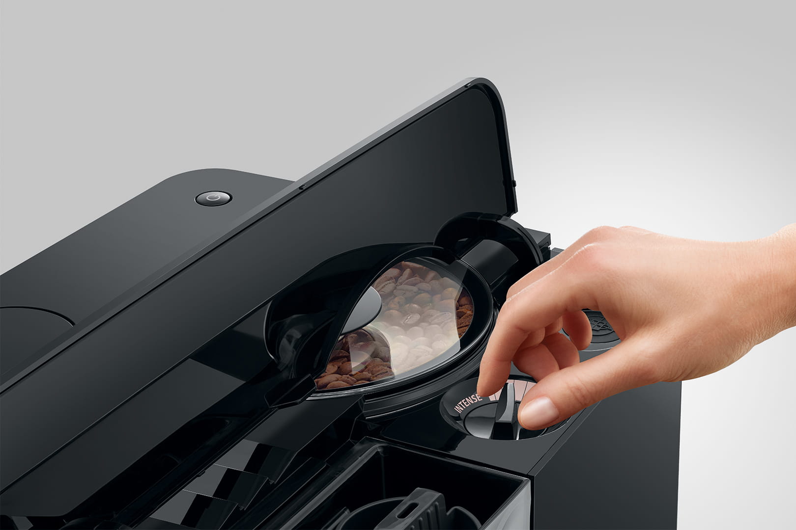 JURA C9 fine-foam milk system preparing a cappuccino